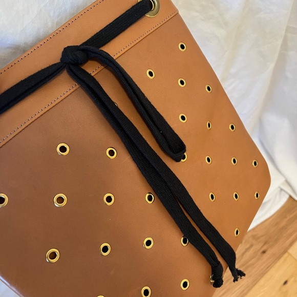 Clare V Delphine Bag with leather grommets and black leather strap. - Picture 11 of 16